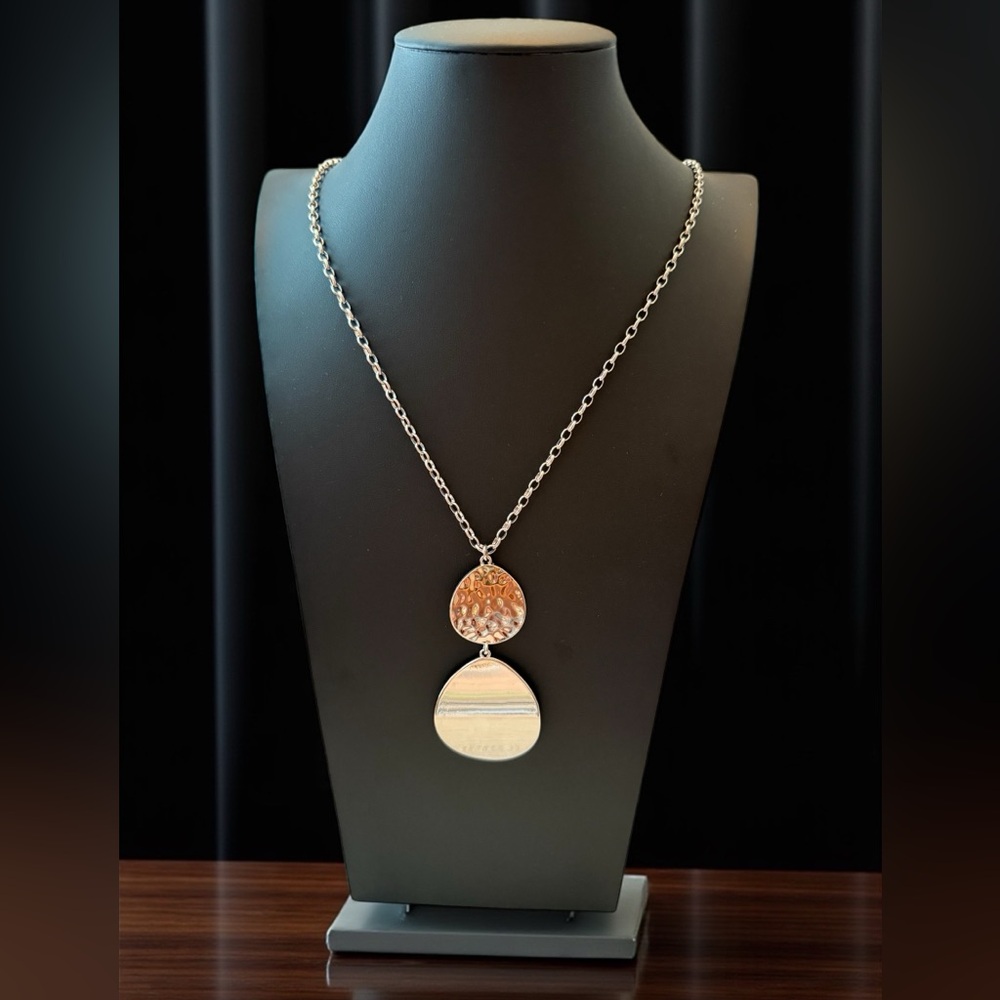 Silver Pendant Necklace. Top circle rough feeling, and lower is smooth silver.